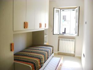 Posteľ alebo postele v izbe v ubytovaní La Casa del Mare