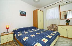 Postel nebo postele na pokoji v ubytování Apartments Novacic