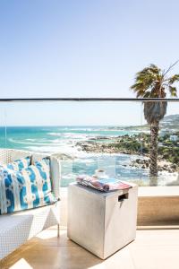 a living room with a view of the ocean at Living Hotel Lion's Eye in Cape Town