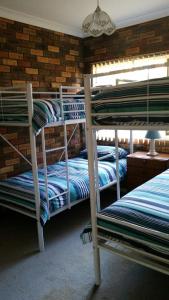 A bunk bed or bunk beds in a room at Unit 2 @ Beach Haven
