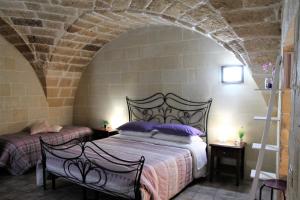 Postel nebo postele na pokoji v ubytování White Suite B&B