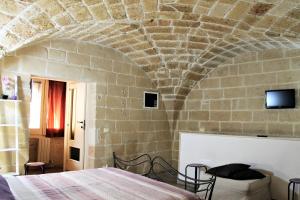 TV a/nebo společenská místnost v ubytování White Suite B&B