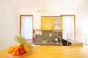 Kuchyňa alebo kuchynka v ubytovaní Santa Marina Apartment Rialto + 19 fotografií