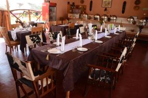 Ресторант или друго място за хранене в Hoima Cultural Lodge