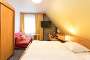 Postel nebo postele na pokoji v ubytování Hotel Restaurant Jägerhof + 22 fotografií