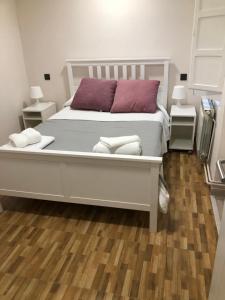 A bed or beds in a room at Madala XXI