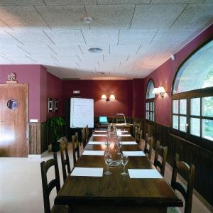 The business area and/or conference room at Hotel Can Blanc