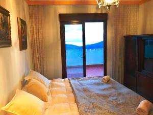 コンペタにあるAtico Miramarのベッドルーム1室(ベッド1台付)が備わります。