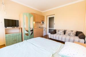 Kuchyňa alebo kuchynka v ubytovaní Lara Apartments