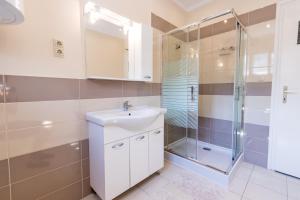 Kúpeľňa v ubytovaní Lara Apartments