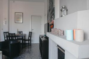 Posedenie v ubytovaní Ático con terraza y vistas