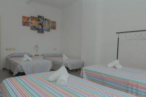 Posteľ alebo postele v izbe v ubytovaní Ático con terraza y vistas