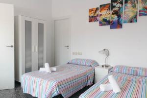 Llit o llits en una habitació de Ático con terraza y vistas