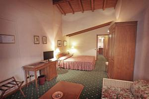 Postel nebo postele na pokoji v ubytování Hotel Faccioli