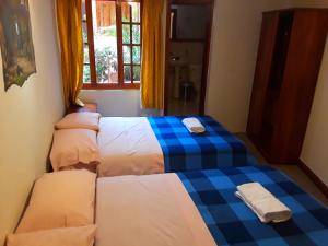 Postel nebo postele na pokoji v ubytování Posada Todos Santos