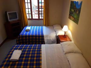 Postel nebo postele na pokoji v ubytování Posada Todos Santos