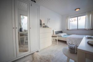 Ένα ή περισσότερα κρεβάτια σε δωμάτιο στο Jopie's Guesthouse +44 φωτογραφίες