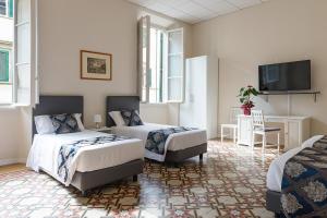 Voodi või voodid majutusasutuse Hotel St. James toas