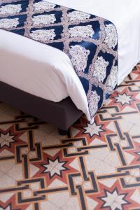 Voodi või voodid majutusasutuse Hotel St. James toas