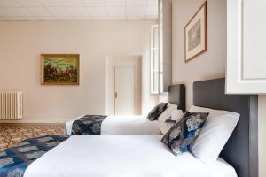 Voodi või voodid majutusasutuse Hotel St. James toas