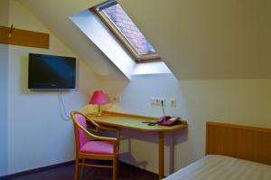 TV a/nebo společenská místnost v ubytování Hotel Park Eckersbach