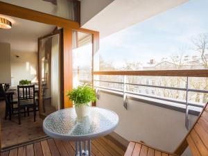 Balkón alebo terasa v ubytovaní VacationClub - Sand Hotel Apartment 308