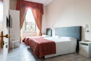 Voodi või voodid majutusasutuse Hotel St. James toas