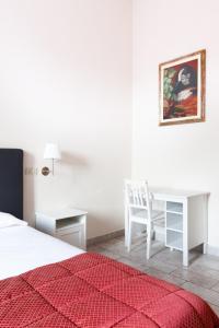 Voodi või voodid majutusasutuse Hotel St. James toas
