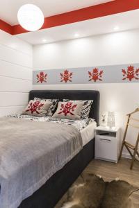 Postel nebo postele na pokoji v ubytování POLANA SZYMOSZKOWA Ski-Resort--PAJO IV