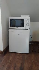Kuchyň nebo kuchyňský kout v ubytování Au repere de Mariette