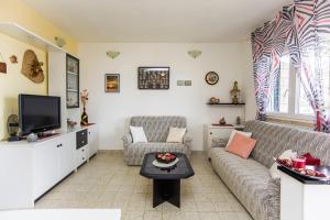 TV a/nebo společenská místnost v ubytování Holiday house "Kale"
