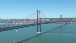 a bridge over a large body of water at modern flat in Estoril