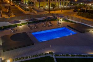 Bazén v ubytování Iberflat Villa Los Pinos nebo v jeho okolí