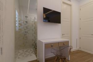 TV a/nebo společenská místnost v ubytování Iberflat Villa Los Pinos