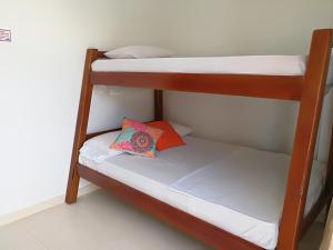 a couple of bunk beds in a room at Miraluna Hotel Boutique in Coveñas