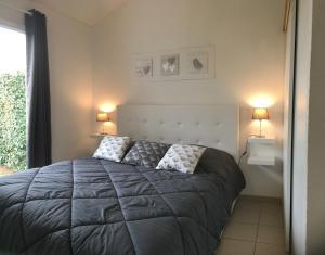 Postel nebo postele na pokoji v ubytování Escale à l'île d'Oléron + 21 fotografií