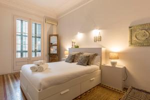 Кровать или кровати в номере BCN Luxury Apartments