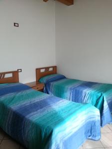 מיטה או מיטות בחדר ב-holiday on the island