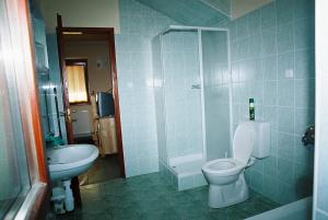 Kúpeľňa v ubytovaní Kertész Apartmanok