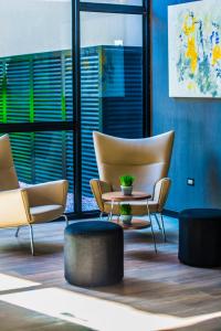 A seating area at Five Hotel & Residences