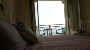 Uma cama ou camas num quarto em Lighthouse Apartments