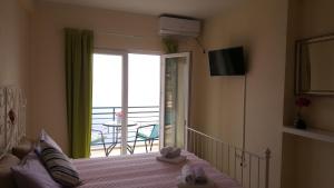 Uma cama ou camas num quarto em Lighthouse Apartments