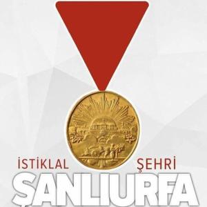 una moneda de oro con el santilli santilli santilli sant en Turkmen Konagi, en Sanlıurfa