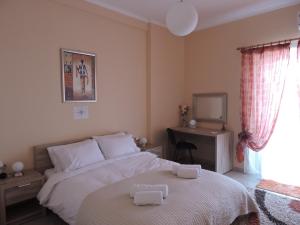 Postel nebo postele na pokoji v ubytování Sweet Suites