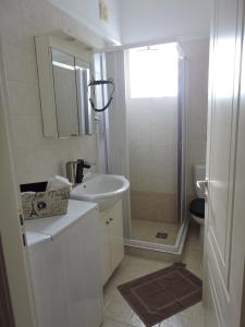 Koupelna v ubytování Sweet Suites