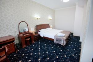 Cama o camas de una habitación en Business Hotel Europa