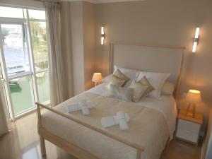 Posteľ alebo postele v izbe v ubytovaní Malaga Benalmadena Puerto Marina Costa Sol Holiday Rentals