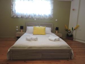 Postel nebo postele na pokoji v ubytování Sweet Suites