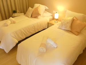 Posteľ alebo postele v izbe v ubytovaní Malaga Benalmadena Puerto Marina Costa Sol Holiday Rentals