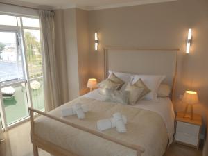 Posteľ alebo postele v izbe v ubytovaní Malaga Benalmadena Puerto Marina Costa Sol Holiday Rentals